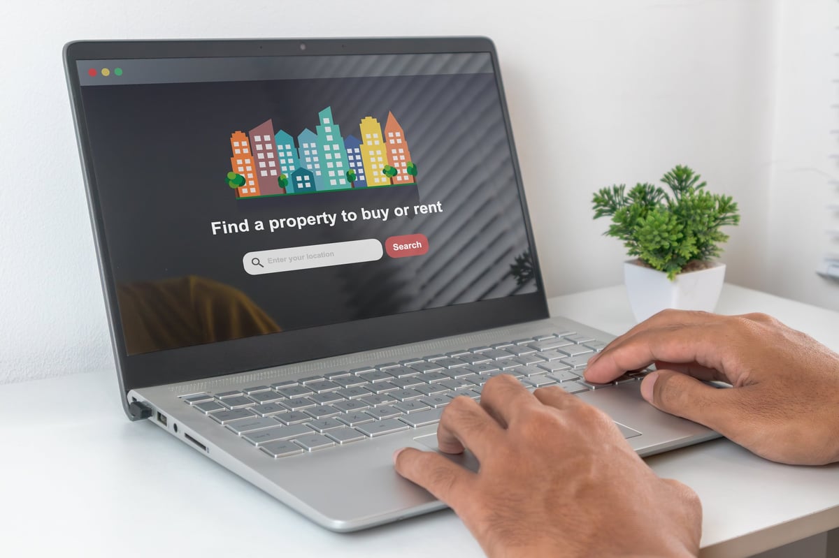 Real estate agent website design concept with featured property listings and lead capture
