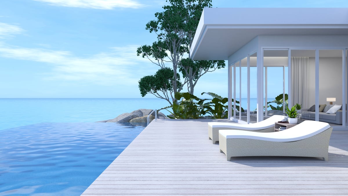 Seaside terrace with swimming pool and sunny blue sea view for Cay Pointe Villas vacation rentals